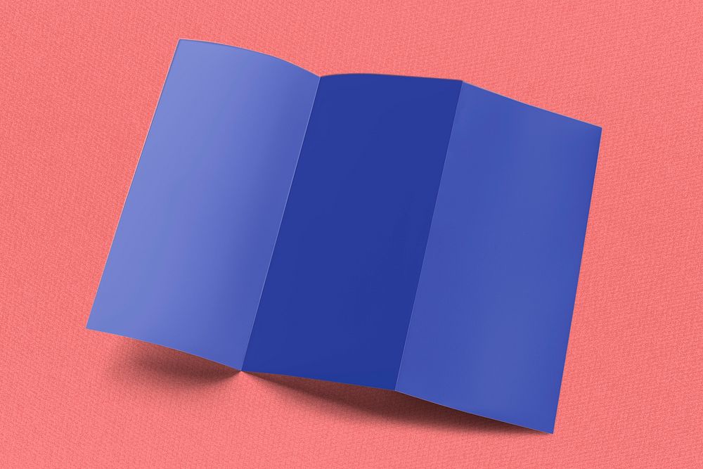 Blue tri-fold brochure on orange background 