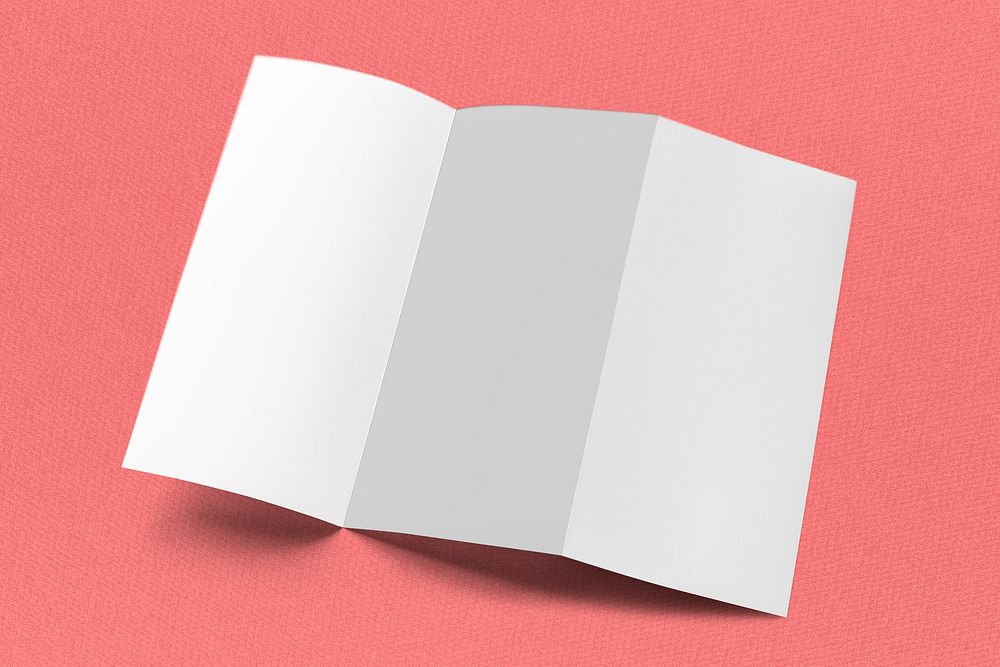 Blank tri-fold brochure on orange background 