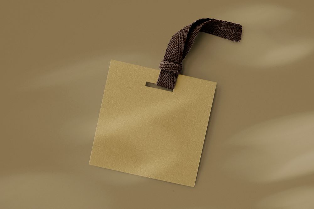Brown clothing tag, apparel branding with blank design space