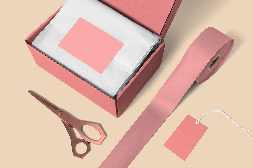 Blank gift card in pink parcel box