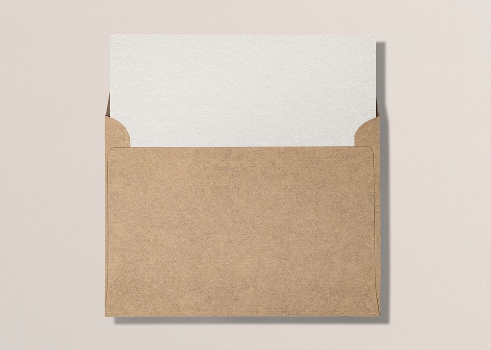 Brown envelope, white card, flat lay design