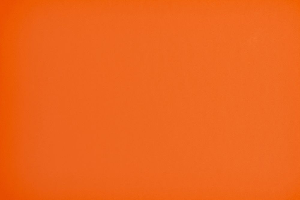 International orange paper texture background, design space