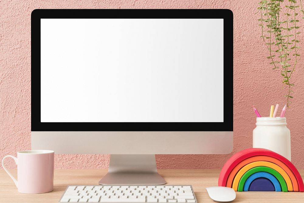 Computer with blank screen, cute feminine workspace