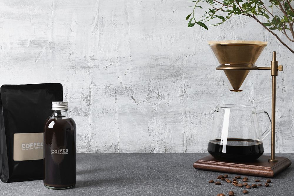 Drip coffee making background, pour over coffee maker and grunge wall