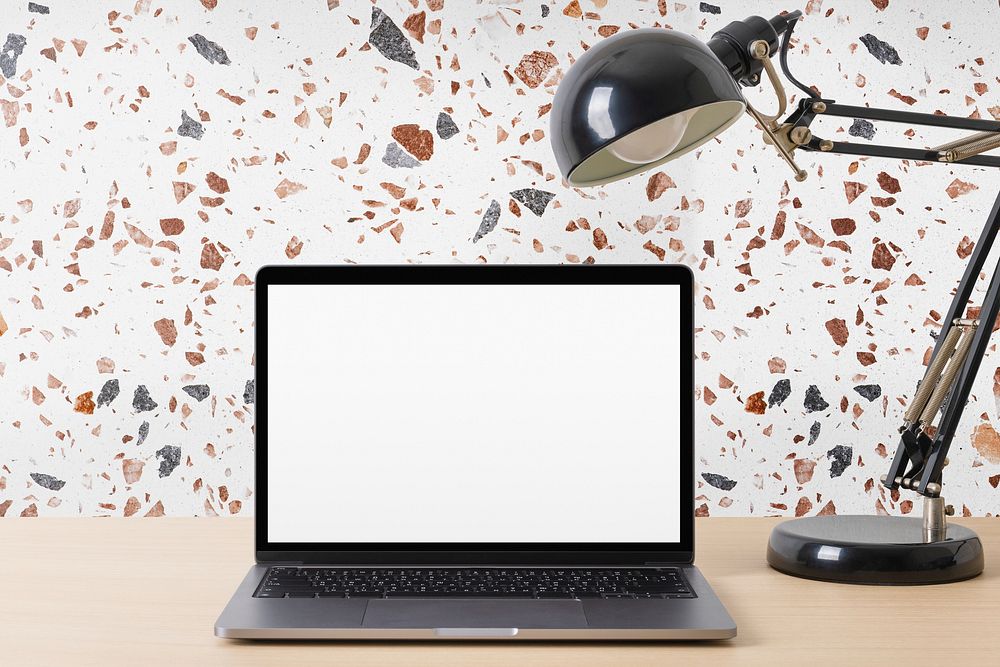 Blank laptop screen, minimal workspace design