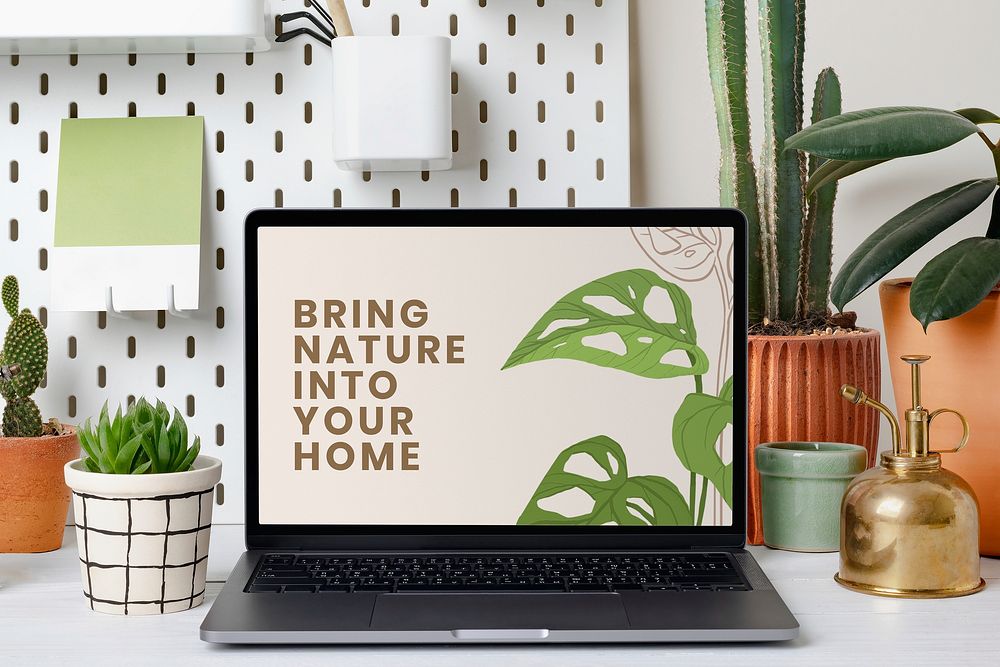 Laptop screen with online plant shop website, aesthetic workspace