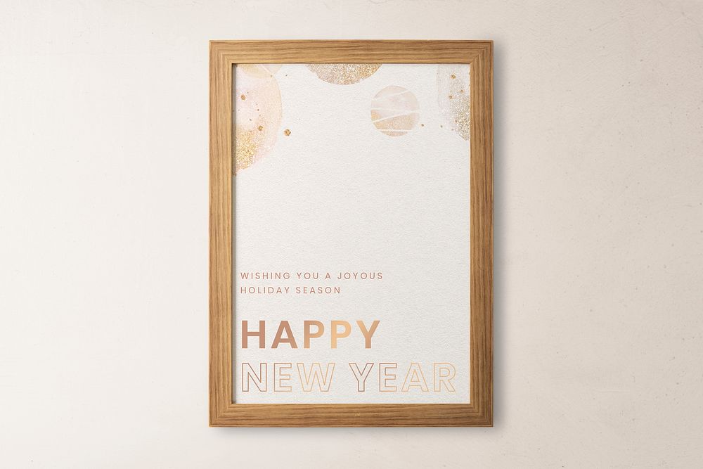 Aesthetic new year greeting, wooden frame, beige wall, home decor