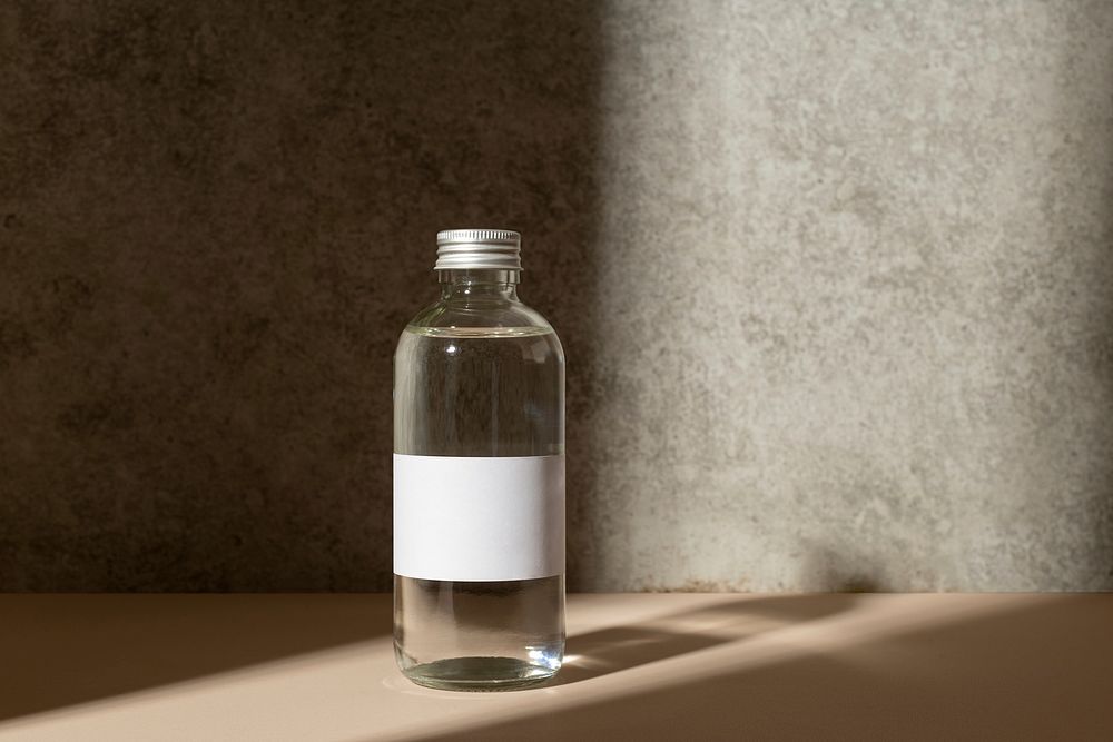 Water bottle with blank label, product branding design