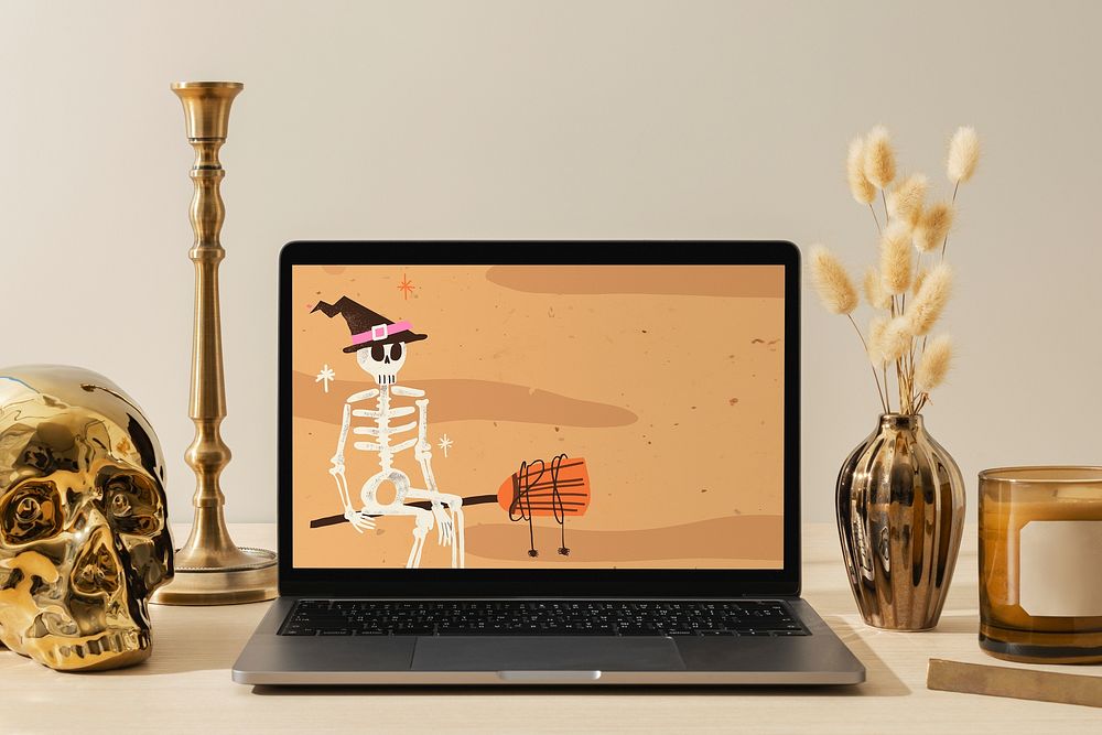 Aesthetic Halloween workspace, laptop screen