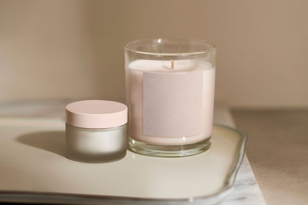 Light pink candle and cream jar, product packaging with design space