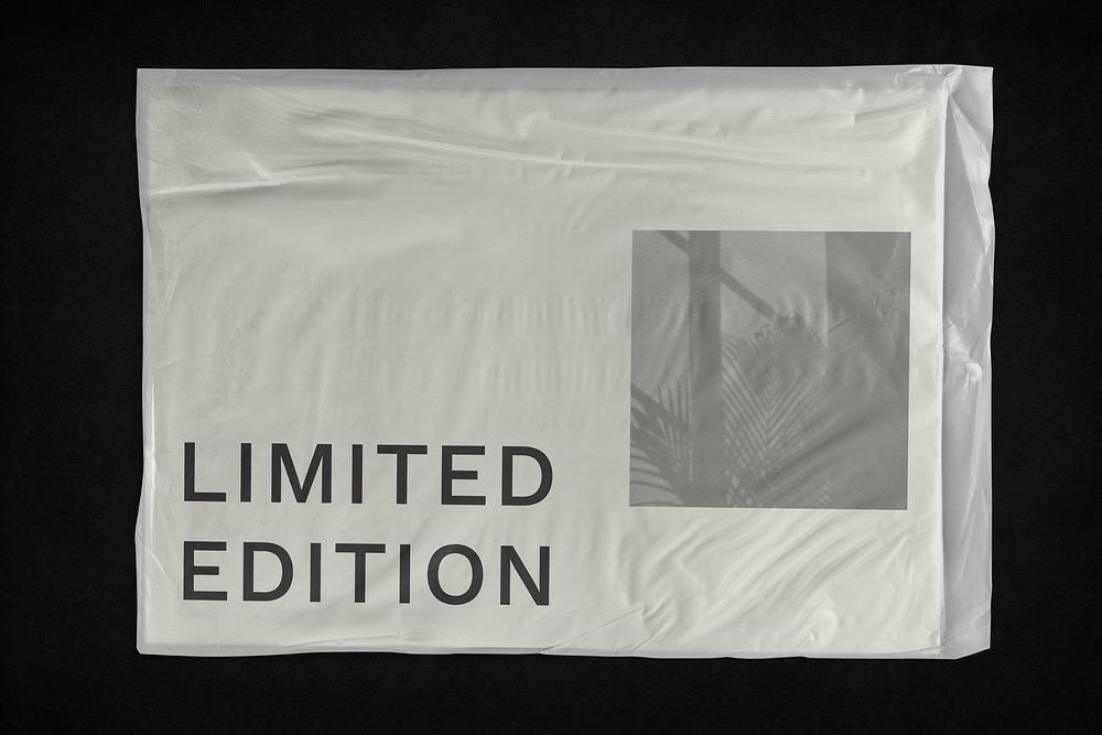 White mailer bag, limited edition text, shipping packaging design