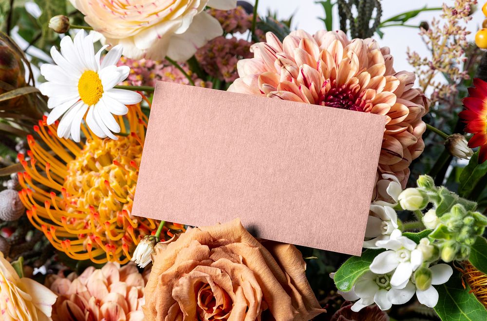 Blank card on flower bouquet