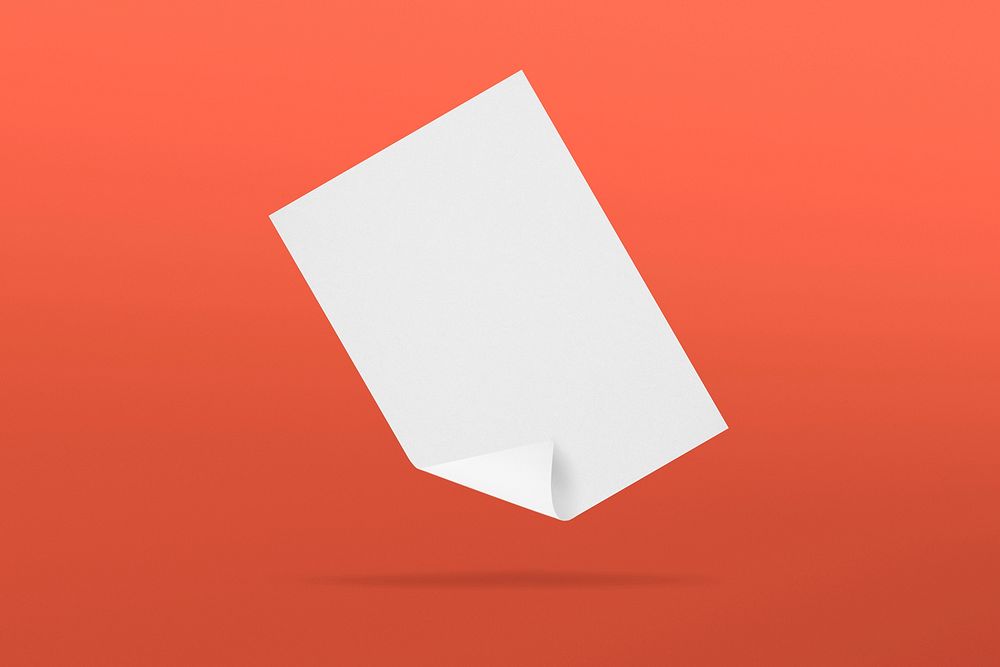 Folded paper document on red background