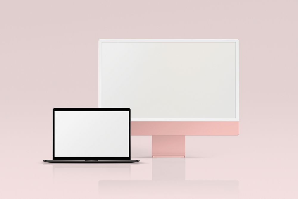 Pink laptop and desktop computer