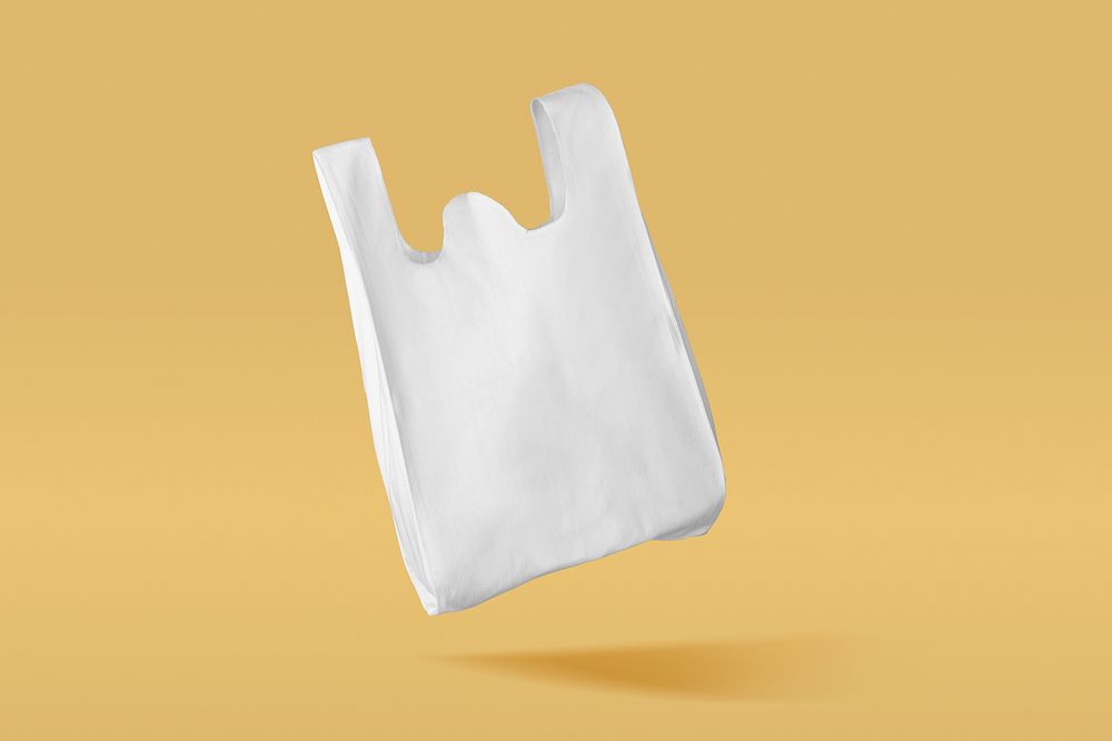 Reusable shopping bag on yellow background 
