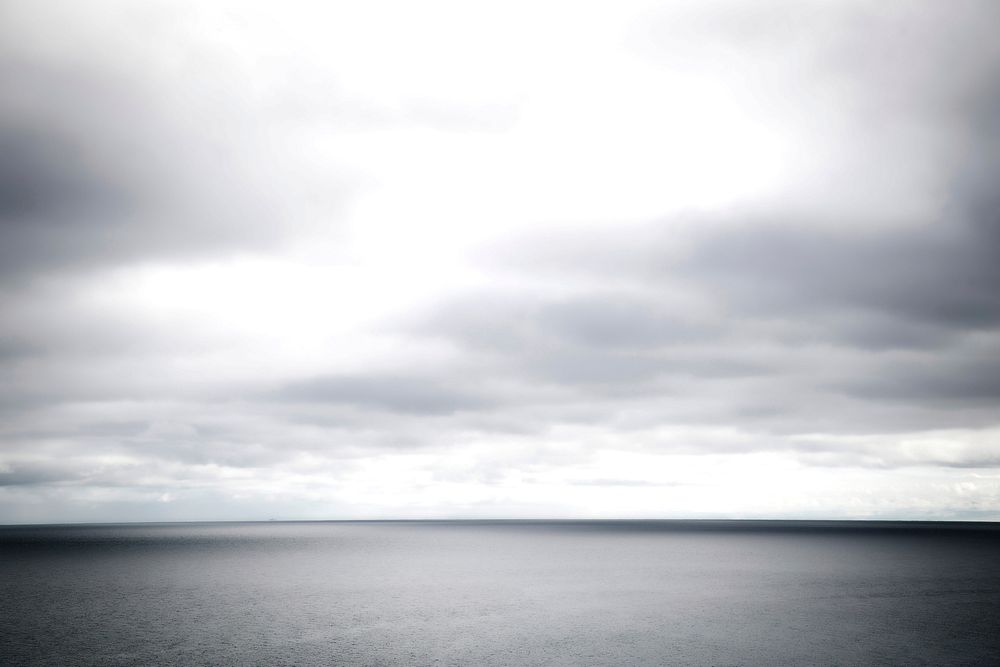 Calm ocean in monochromatic photo, free public domain CC0 image.