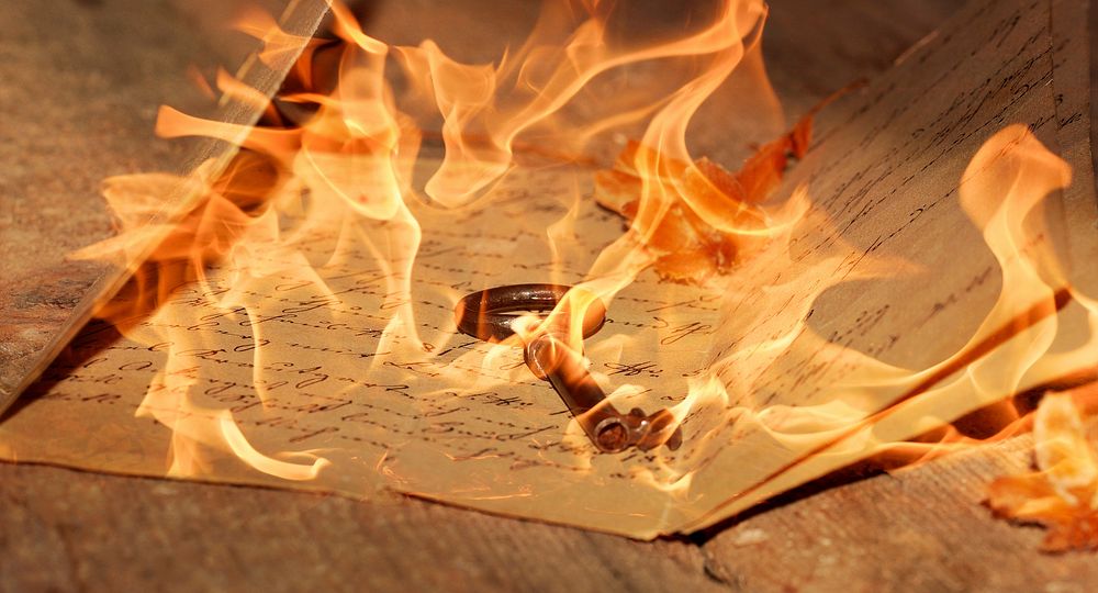 Free letter and key on fire photo, public domain CC0 image.