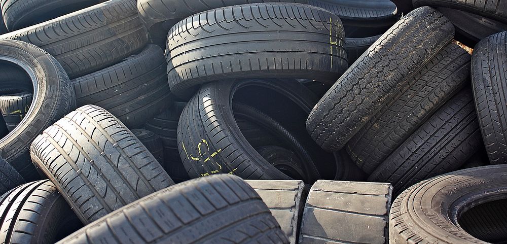 Pile of car tyre photo, free public domain CC0 image.
