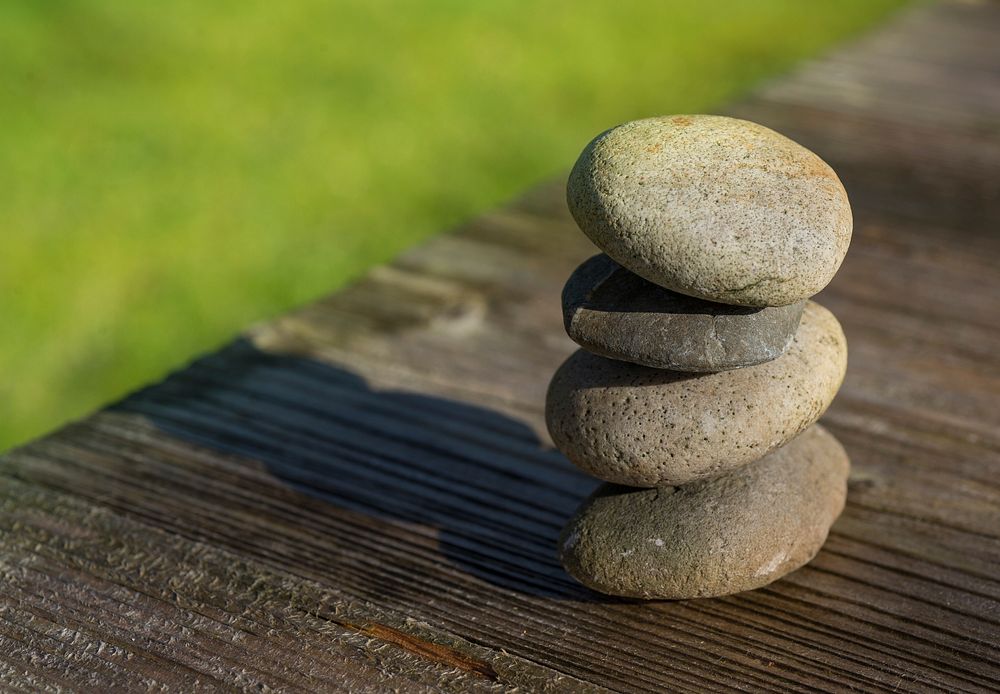 Stacked wellness zen stones, free public domain CC0 photo.