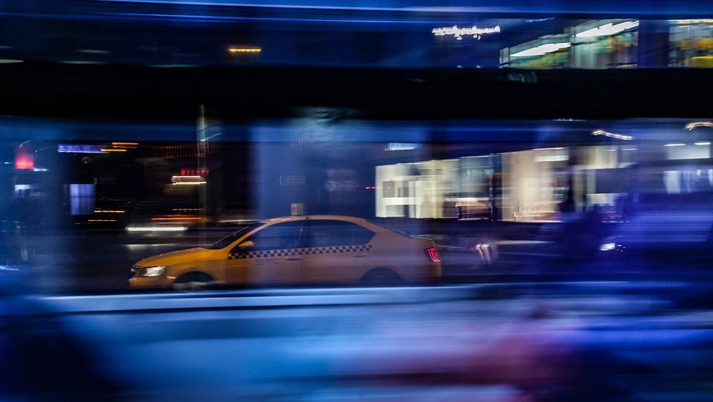 Car driving in speed motion photo, free public domain CC0 image.