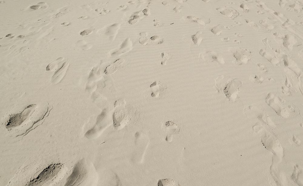 Free footprints in sand image, public domain beach CC0 photo.