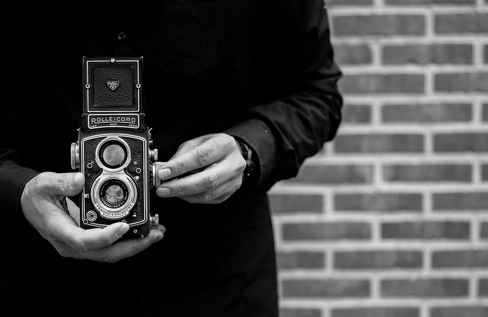 Man holding Rolleicord camera, location unknown, 25 September 2017.
