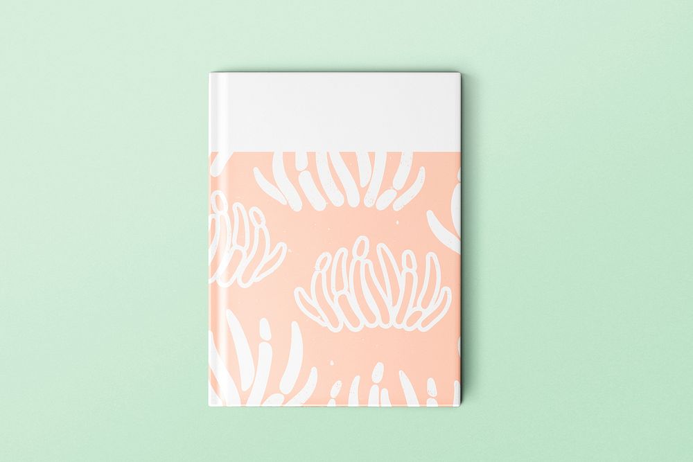 Book cover with coral reef illustration in pastel orange
