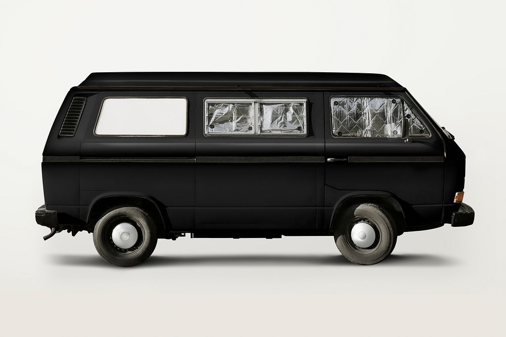 Old black van, classic vehicle for camping