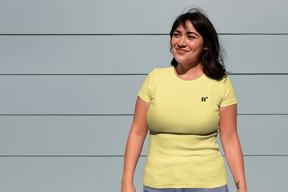 Happy Latina woman wearing a yellow tshirt