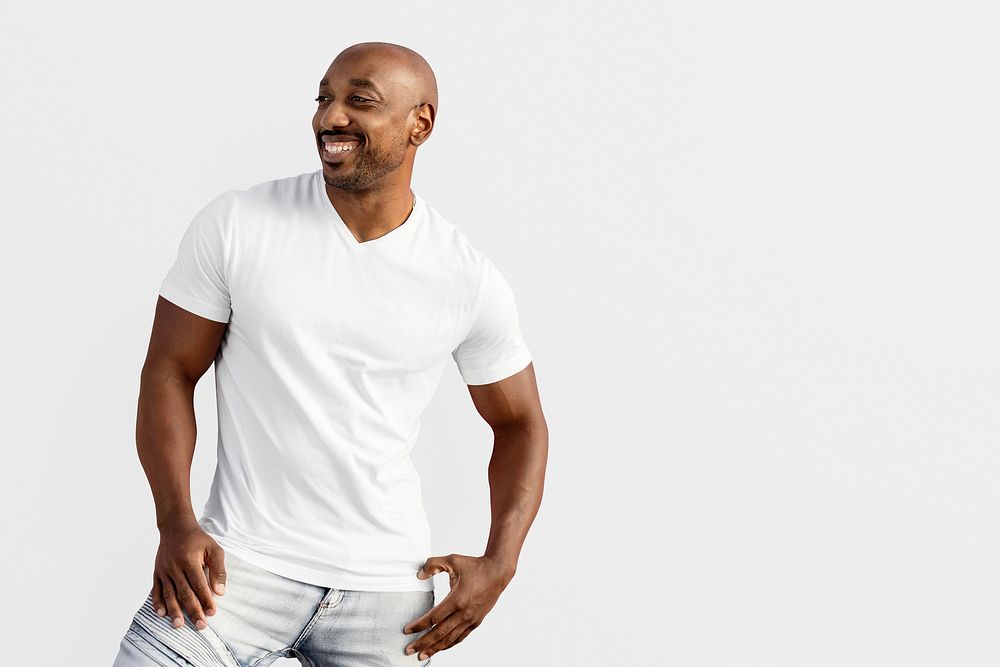 Men's casual clothing in white, smiling African American man