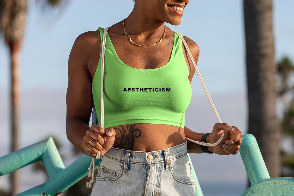Neon athleisure outfit, woman wearing tank top at the Venice beach, aestheticism text