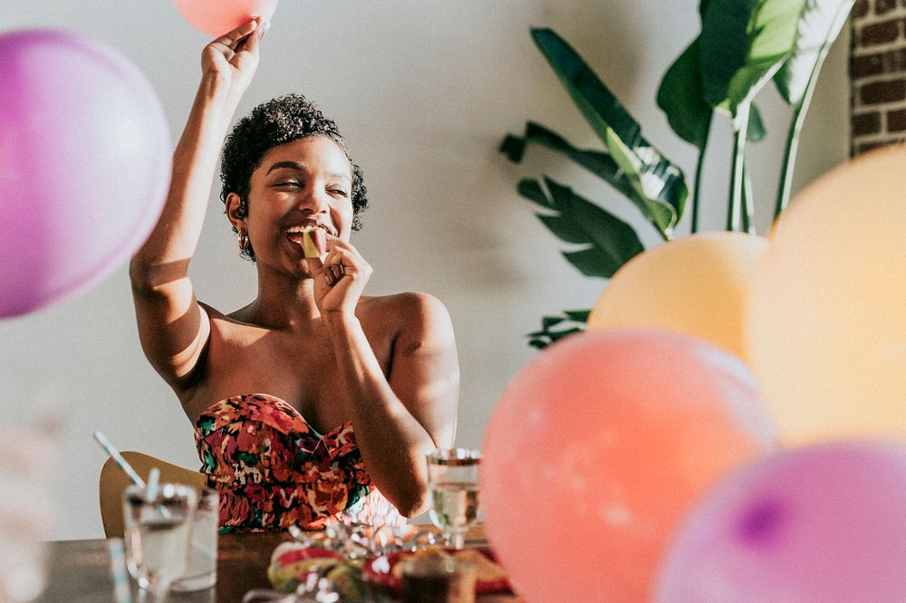A young woman celebrating at a party