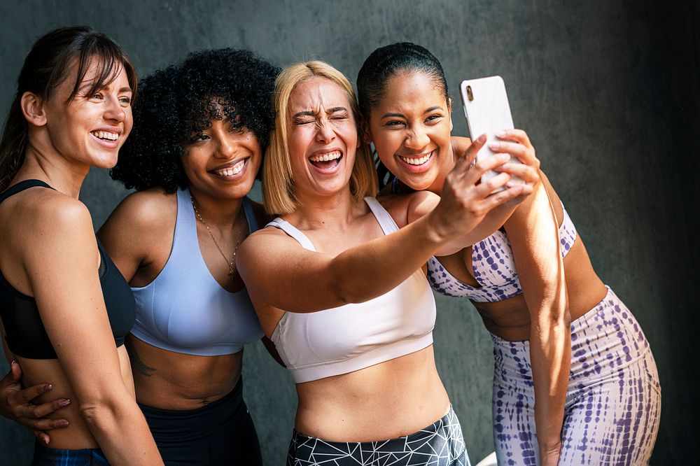 Cheerful sporty women taking a selfie