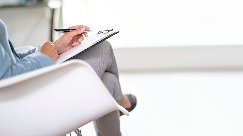 Businesswoman holding a personal notebook