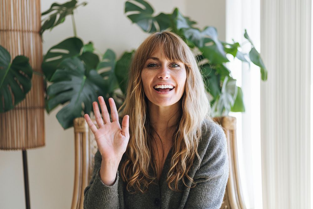 Happy woman at home during coronavirus quarantine 