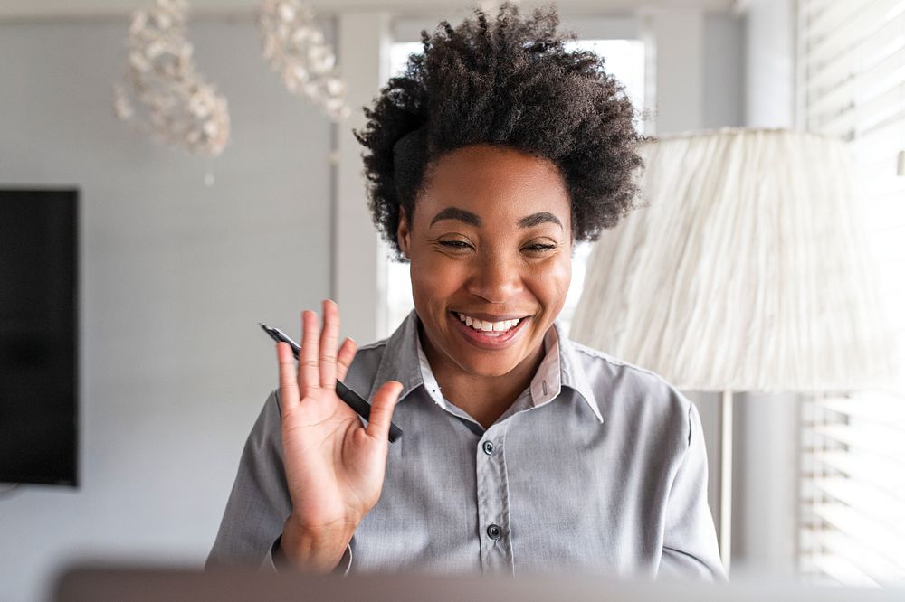 Woman having an online class studying through e-learning system