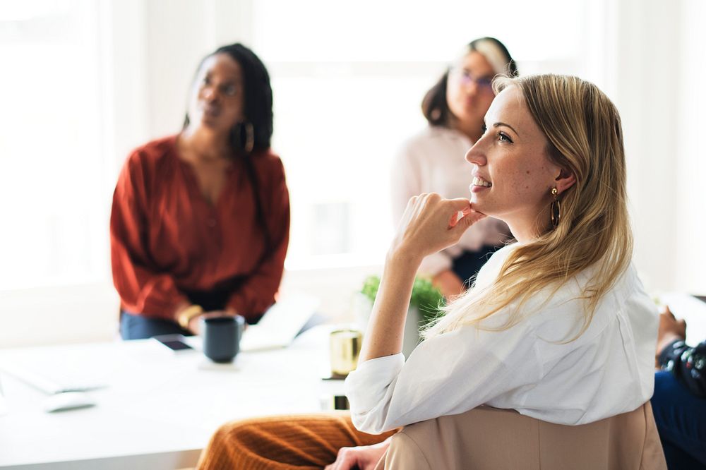 Happy businesswomen in a meeting