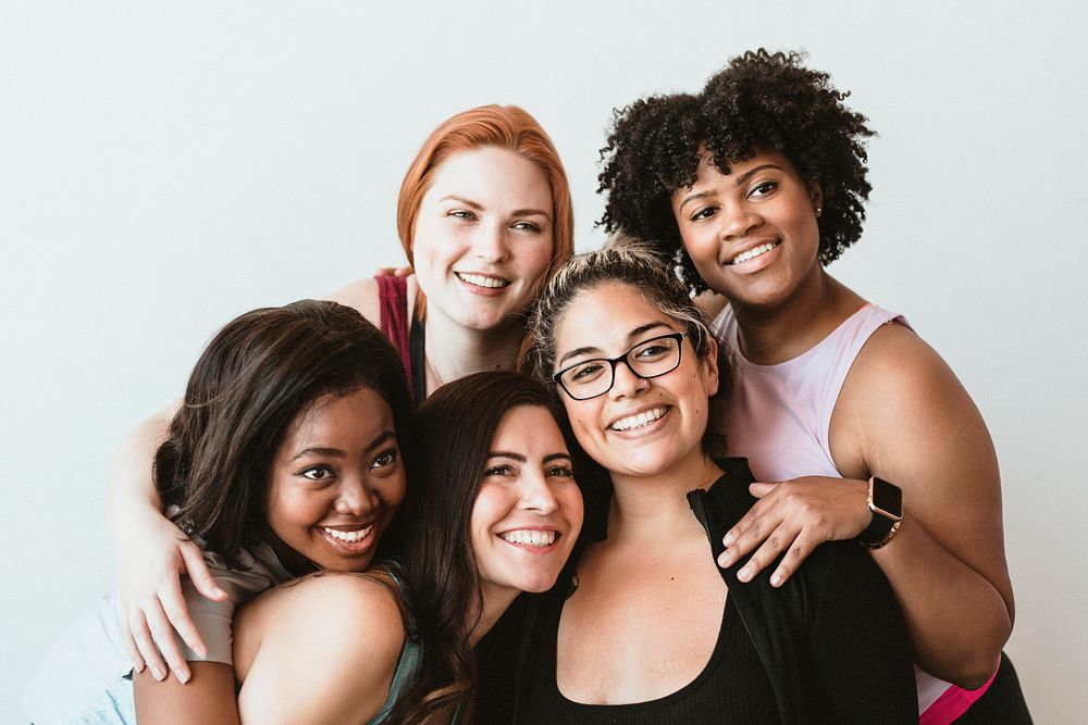 Cheerful sporty women in a studio