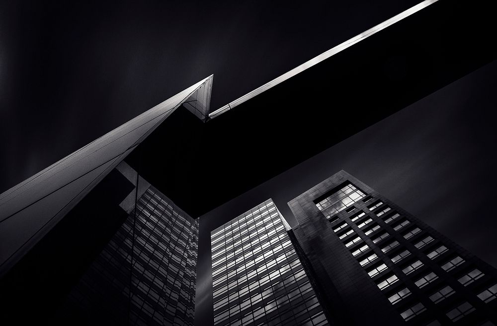 A low-angle shot of tall office buildings. Original public domain image from Wikimedia Commons