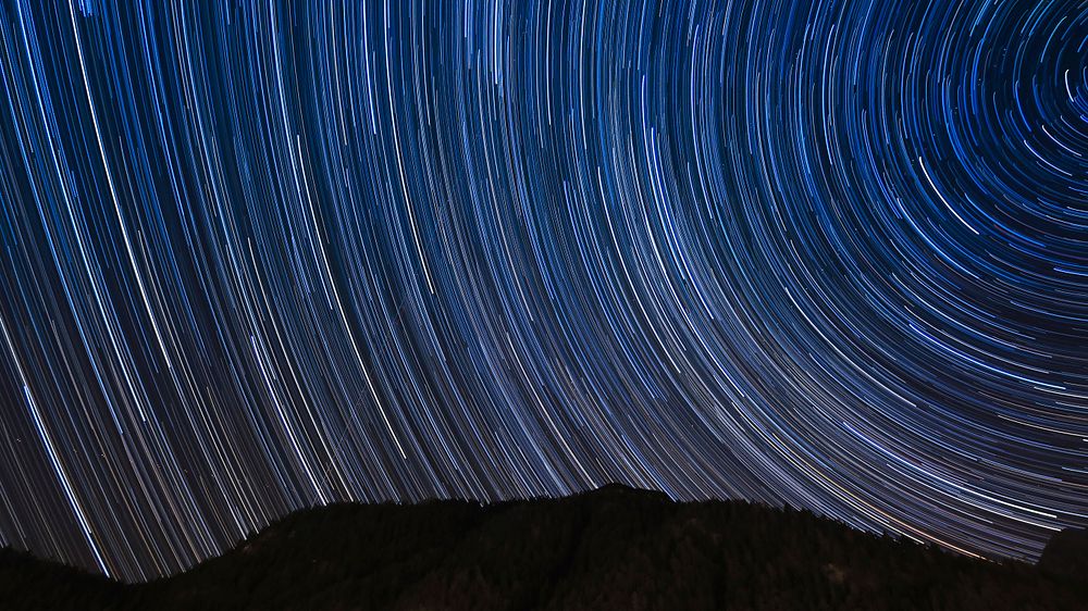 An astronomy timelapse shot in Leutasch of a starry night sky. Original public domain image from Wikimedia Commons