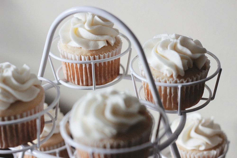 Cupcakes with frosting on display. Original public domain image from Wikimedia Commons