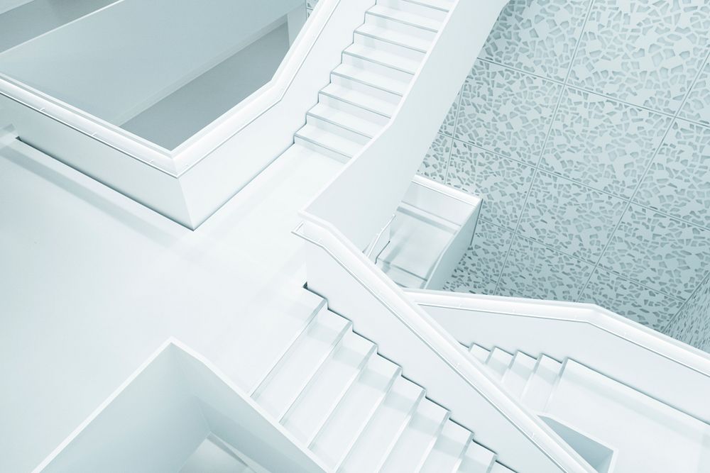 A snow-white stairway in a building in Cologne. Original public domain image from Wikimedia Commons