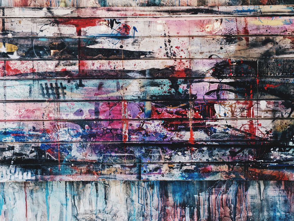 Splattered colors of paint on a paneled wall. Original public domain image from Wikimedia Commons