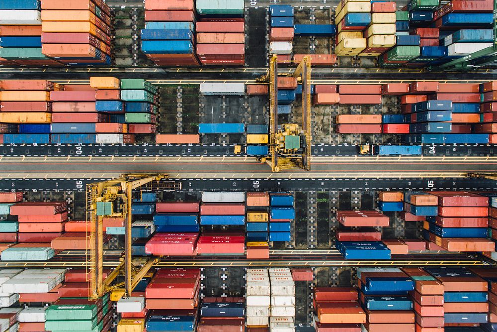 A drone shot of colorful shipping containers in a terminal in Singapore. Original public domain image from Wikimedia Commons