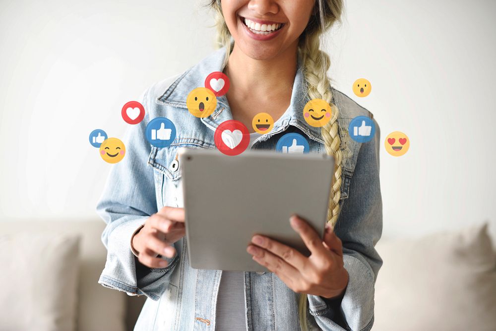 Cheerful woman watching a live video