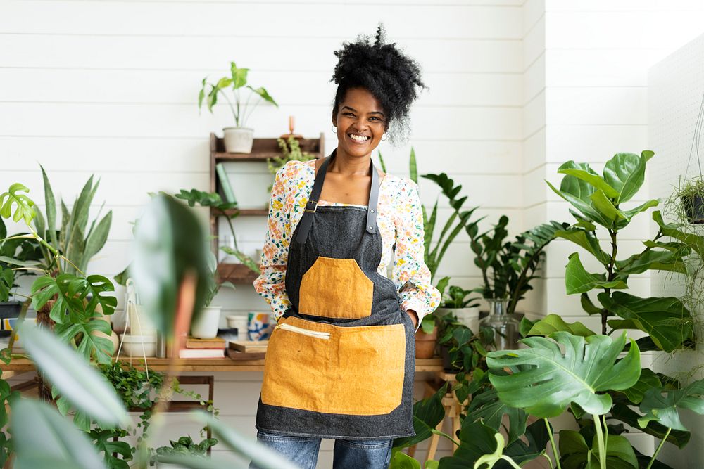 Happy small business owner at a plant shop