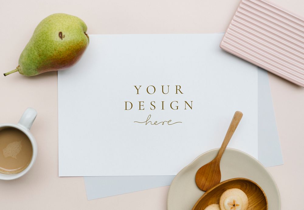 White card mockup on a pastel pink table