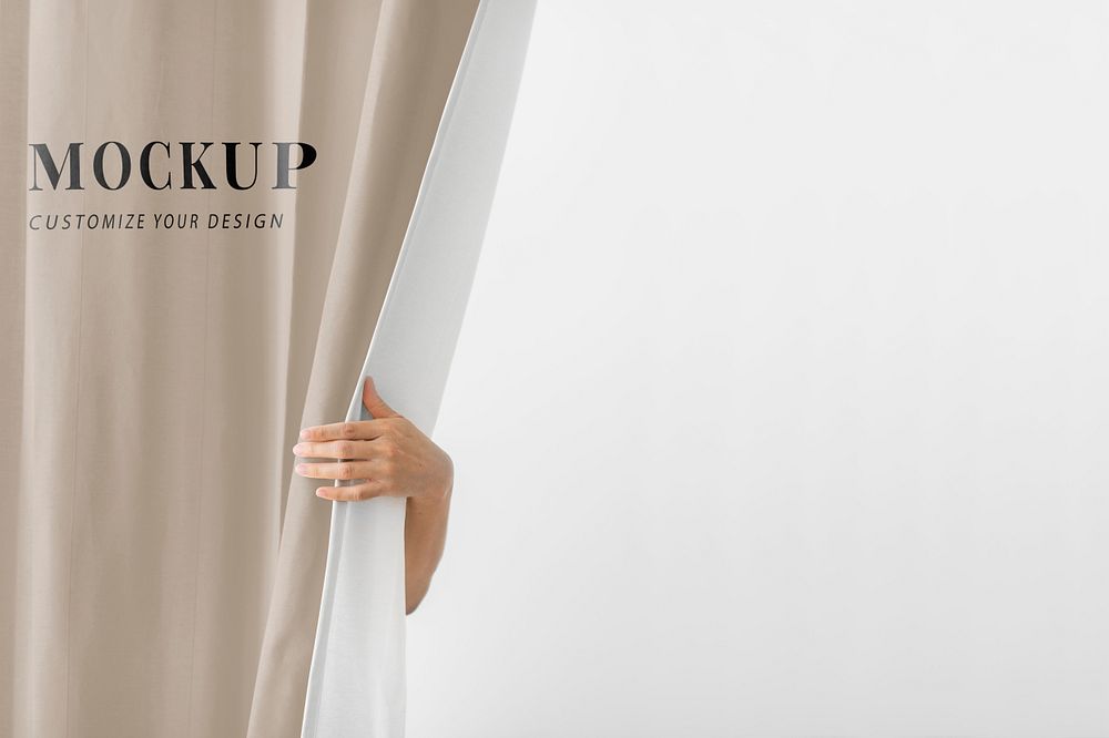Hand opening a brown curtain mockup
