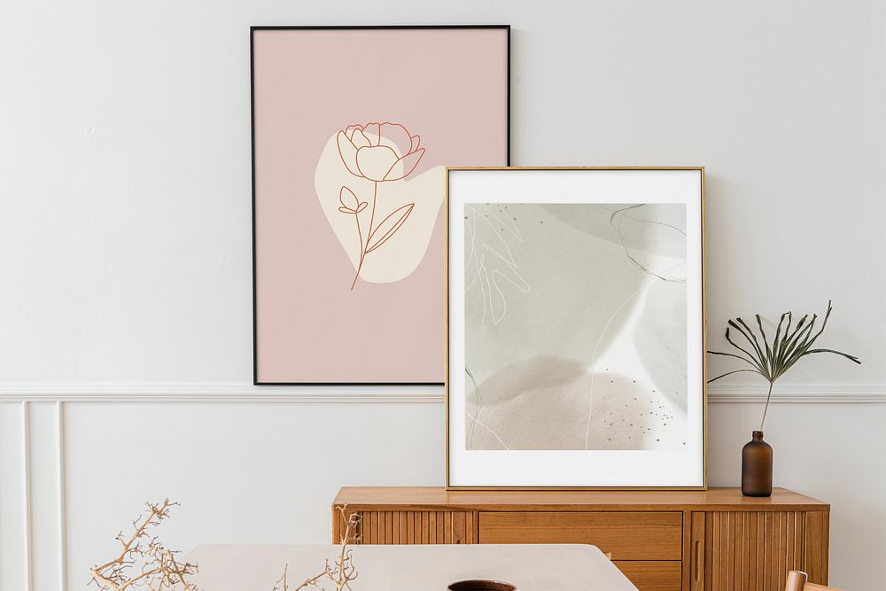Picture frame mockups over a wooden sideboard table