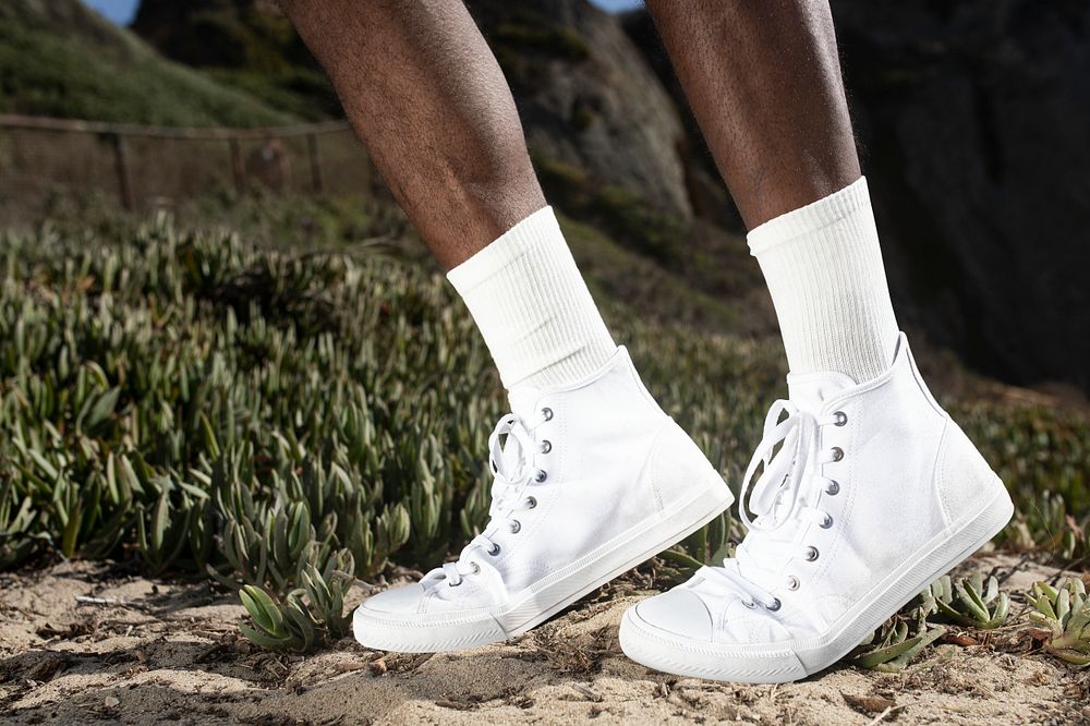Ankle sneakers mockup psd in white beach fashion shoot